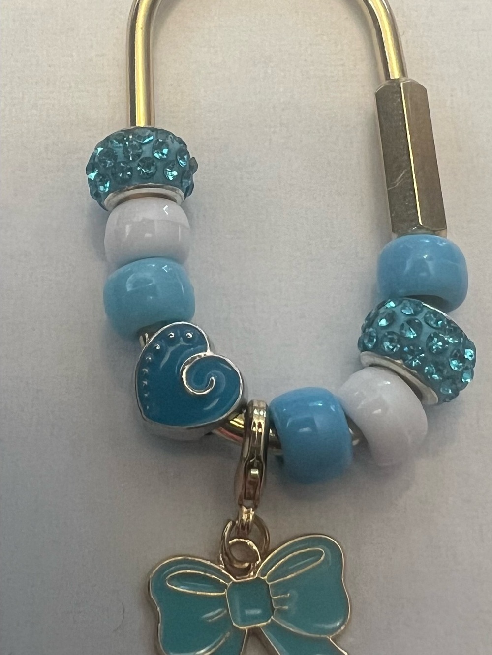 Turquoise and White Beaded Charm Bracelet with Bow Pendant
